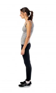 Girl standing with poor posture. Poor posture leads to back, neck and shoulder pain. Our chiropractors in London, On will get you feeling better quickly and isolate what caused the issue so that it doesn’t return